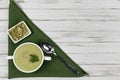 Vegetarian cream of broccoli, potato, onion, sesame and olive oil, and coconut milk. soup served in a white ceramic plate with a Royalty Free Stock Photo