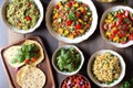 Vegetarian cuisine. Tasty Couscous with vegetables and spices, Bowls of healthy vegetarian lentil salad , Generative AI