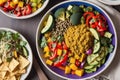 Vegetarian cuisine. Tasty Couscous with vegetables and spices, Bowls of healthy vegetarian lentil salad , Generative AI