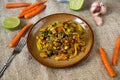 Vegetarian curry with noodle udon, tofu, vegetable and seeds