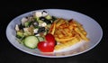 Vegetarian diet food cucumber salad apple grill potato fries olives