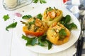 Peppers stuffed with quinoa, shrimp and vegetables on white wooden table. Copy space Royalty Free Stock Photo