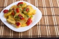 Vegetarian dish of slices of stewed potatoes