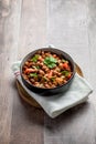 Vegetarian dish of stewed pink beans and tomatoes. A delicious bean dish served