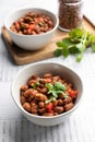 Vegetarian dish of stewed pink beans and tomatoes. A delicious bean dish served