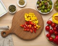 Vegetarian food. Chopping pepper, cutting vegetables for greek salad horiatiki. Royalty Free Stock Photo