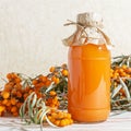 Vegetarian food, healthy nutrition, preserving the harvest of ripe juicy sea-buckthorn, preparing fresh healthy vitamin drink and