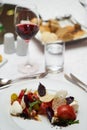 Vegetarian food with marinated tomatoes, arugula, mozzarella che Royalty Free Stock Photo
