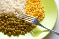 Vegetarian food: rice, green peas and corn