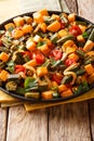 Vegetarian food: stew okra, sweet potatoes, tomatoes, onions and