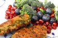 Vegetarian food. Vegetable cutlets from red lentils, onions, parsley and oatmeal. With salad of broccoli, pomegranate seeds and bl