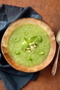 Vegetarian green cream soup in ceramic bowl Royalty Free Stock Photo