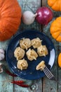 Vegetarian healthy dish. Pumpkin manti, traditional steamed dump