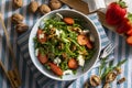 Vegetarian and healthy salad of green, natural, raw and freshly cut arugula rÃÂºgula sprouts and leaves brassicaceae, with