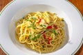 Vegetarian Italian Pasta Spaghetti Aglio E Olio with garlic bread, red chili flake, parsley, parmesan cheese. Royalty Free Stock Photo