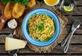 Vegetarian Italian Pasta Spaghetti Aglio E Olio with garlic bread, red chili flake, parsley, parmesan cheese and glas of Royalty Free Stock Photo