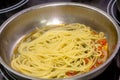 Vegetarian Italian Pasta Spaghetti Aglio E Olio with garlic bread, red chili flake, parsley, parmesan cheese. Royalty Free Stock Photo