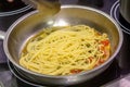Vegetarian Italian Pasta Spaghetti Aglio E Olio with garlic bread, red chili flake, parsley, parmesan cheese. Royalty Free Stock Photo