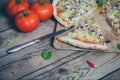 Vegetarian italian pizza on wodden table.