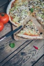 Vegetarian italian pizza on wodden table.