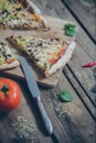 Vegetarian italian pizza on wodden table.