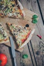 Vegetarian italian pizza on wodden table.