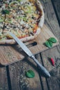 Vegetarian italian pizza on wodden table.