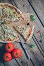 Vegetarian italian pizza on wodden table.