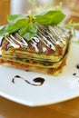 Vegetarian lasagna with tomato and pesto sauces Royalty Free Stock Photo