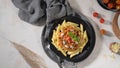 Vegetarian lentil Bolognese sauce penne pasta on a dark background. Healthy eating concept Royalty Free Stock Photo