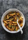 Vegetarian lentil Bolognese sauce penne pasta on a dark background, top view. Healthy eating concept Royalty Free Stock Photo