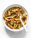 Vegetarian lentil Bolognese sauce penne pasta on a light background, top view. Healthy eating concept Royalty Free Stock Photo