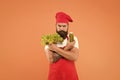 Vegetarian lifestyle. raw healthy food concept. organic eco vegan products. bearded man chef in apron and hat. healthy Royalty Free Stock Photo