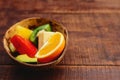 Vegetarian low-calorie salad with fresh fruits, spinach and pomegranate seeds.