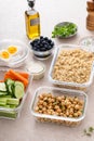 Vegetarian lunch meal prep in containers, high protein with quinoa, chickpeas, vegetables and boiled eggs