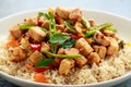 Vegetarian meat free mycoprotein pieces vegetable stir fry, brown rice served in white plate Royalty Free Stock Photo