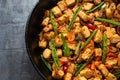Vegetarian meat free mycoprotein pieces vegetable stir fry served in cast iron skillet frying pan Royalty Free Stock Photo