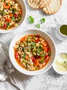 Vegetarian minestrone - delicious healthy mediterranean lunch. On a light table