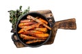 Vegetarian Oven baked sweet potato fries. Isolated on white background, Top view. Royalty Free Stock Photo