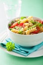 Vegetarian pasta fusilli with tomato peas herbs Royalty Free Stock Photo