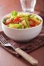 Vegetarian pasta fusilli with tomato peas herbs Royalty Free Stock Photo