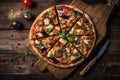 A Vegetarian Pizza on a Rustic Wooden Setting Royalty Free Stock Photo