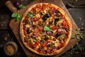 A Vegetarian Pizza on a Rustic Wooden Setting Royalty Free Stock Photo