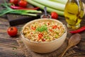 Vegetarian porridge from Turkish couscous with vegetables.