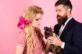 Vegetarian. retro happy woman and man hold pheasant. Crazy couple on pink. Halloween. Creative idea. Bird flu. Funny