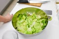 Vegetarian salad in a metal bowl. vegetable salad in stainless steel strainer