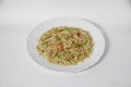 Vegetarian Schezwan Noodles or Vegetable Hakka Noodles or Chow Mein in white plate at wooden background. Schezwan Noodles is indo-