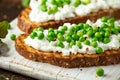 Vegetarian seeded sourdough bread open sandwich with cottage cheese and petit poit peas sprinkled with chilli flakes