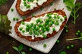 Vegetarian seeded sourdough bread open sandwich with cottage cheese and petit poit peas sprinkled with chilli flakes Royalty Free Stock Photo