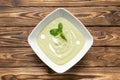 Vegetarian spinach cream soup with yogurt and mint leaves Royalty Free Stock Photo